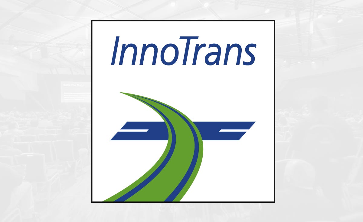 InnoTrans logo overlayed on a gray opaque background of an event conference